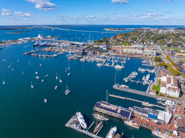Aerial drone view of Newport Harbor, sailboats, marinas, and the Newport Bridge
