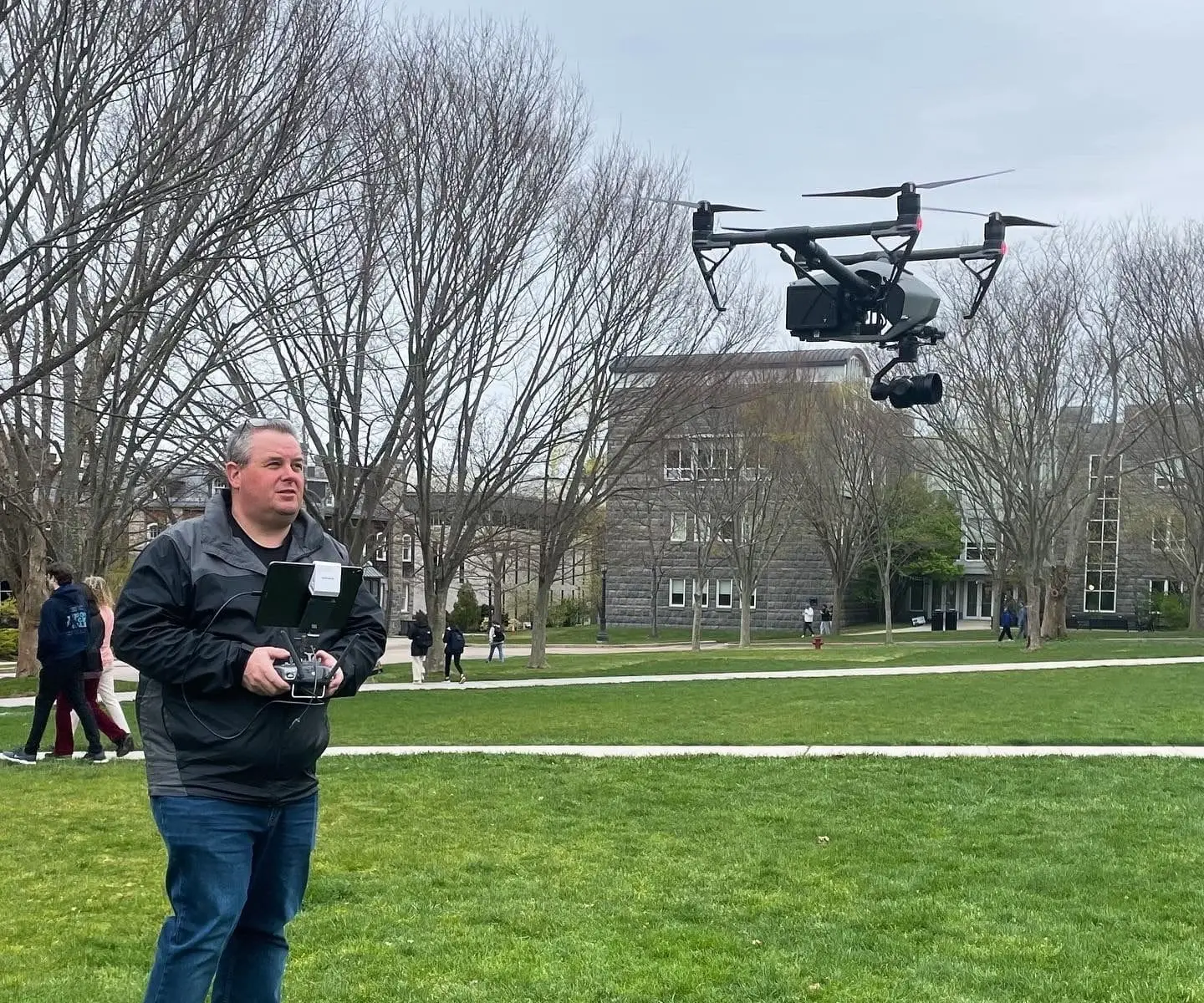 Rhode Island Drone operator Sean McVeigh flying a drone for photography and video drone work at the University of Rhode Island